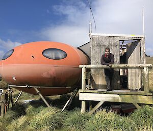 Spatial ecologist Dr Aleks Terauds on the cold porch outside the Waterfall Bay googie.