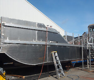 One of the aluminium jet barges under construction in a Tasmanian shipyard.