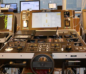The central conning (driving) console.