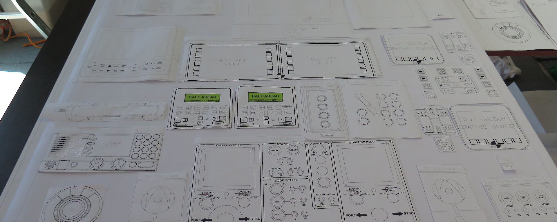 A 1:1 scale mock-up on paper of the central conning console.