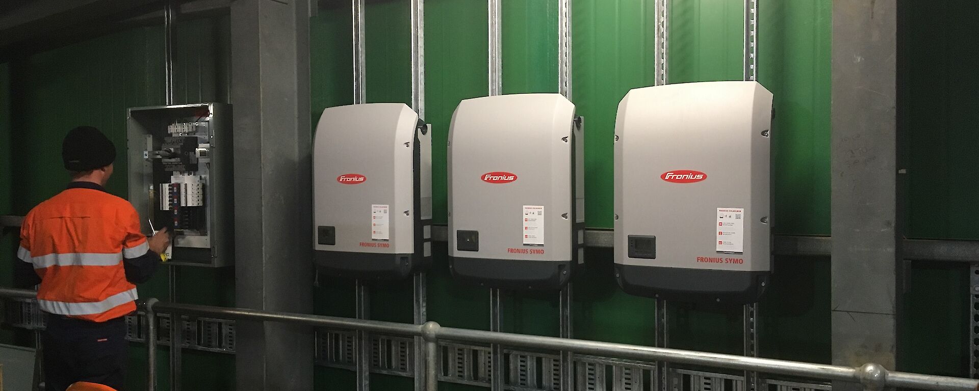 The three inverters that convert DC power into 240V AC power.