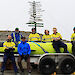 The 8 AUV team members standing beside the AUV at Davis station.