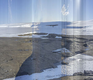 A photo of a landscape with vertical stripes through it