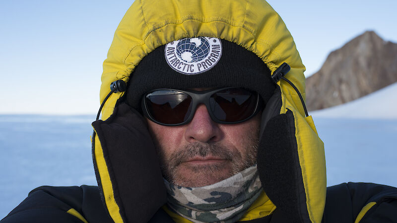 An expeditioner in an icy landscape