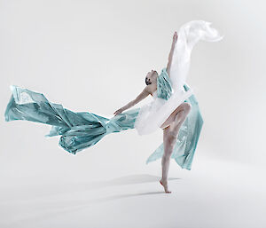 A dancer trailing fabric