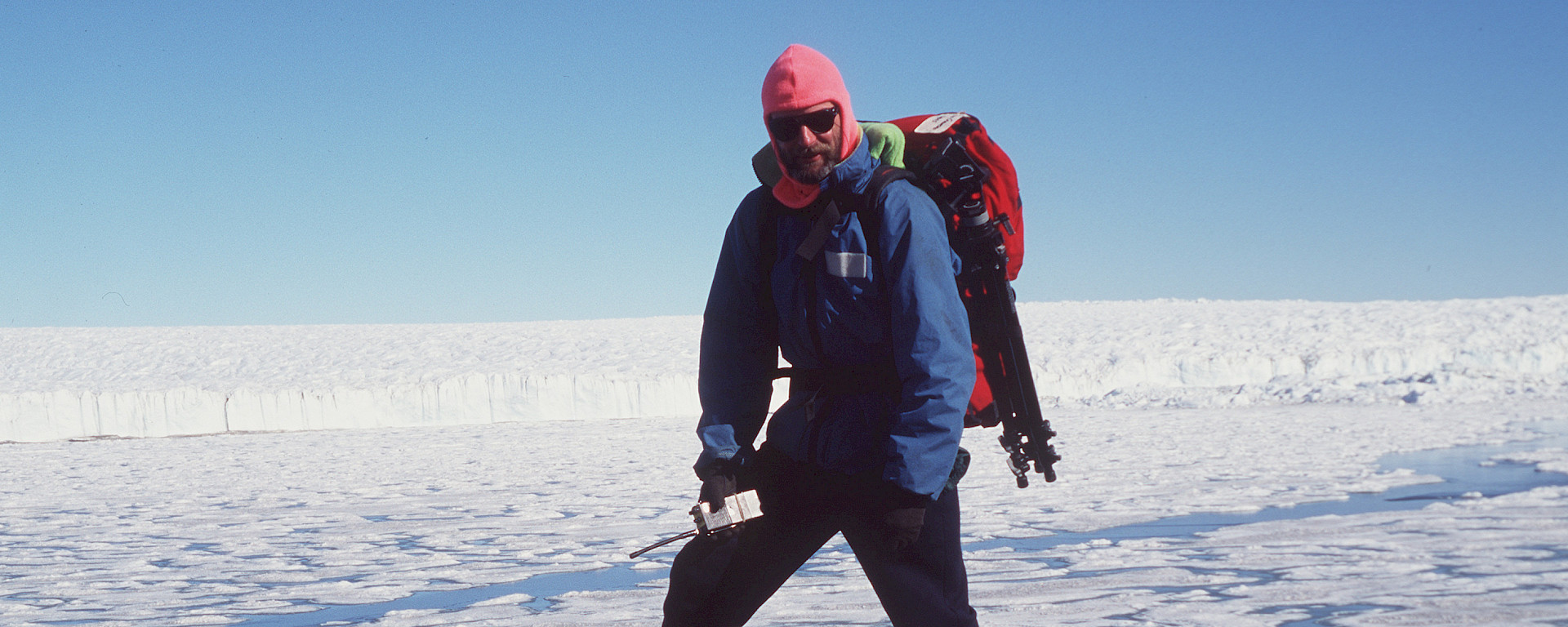 Denis Crawford poses in front of Sørsdal Glacier.