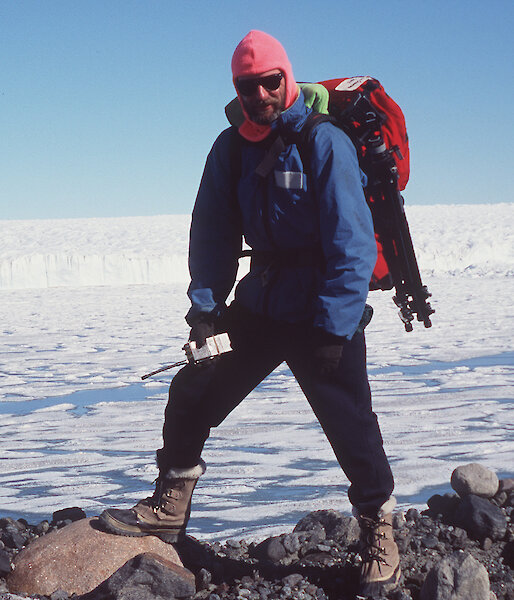 Denis Crawford poses in front of Sørsdal Glacier.
