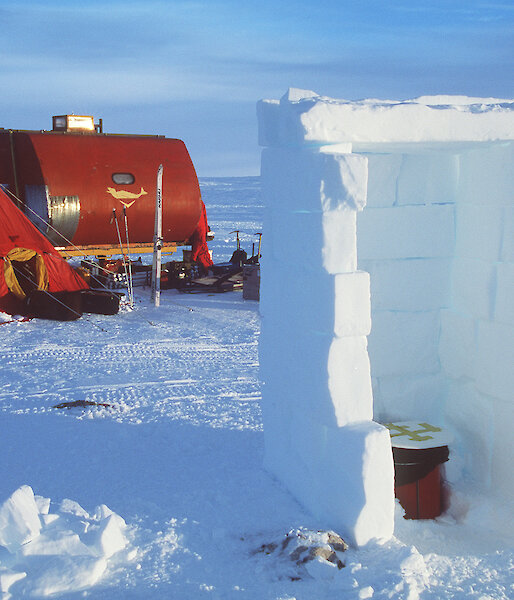 Field toilet in igloo. Tent and RMIT van in background