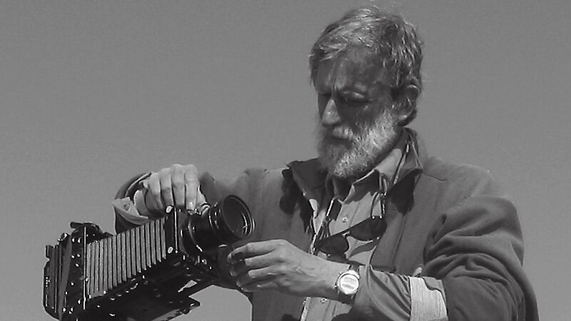 David Neilson photographing on Welch Island near Mawson Station