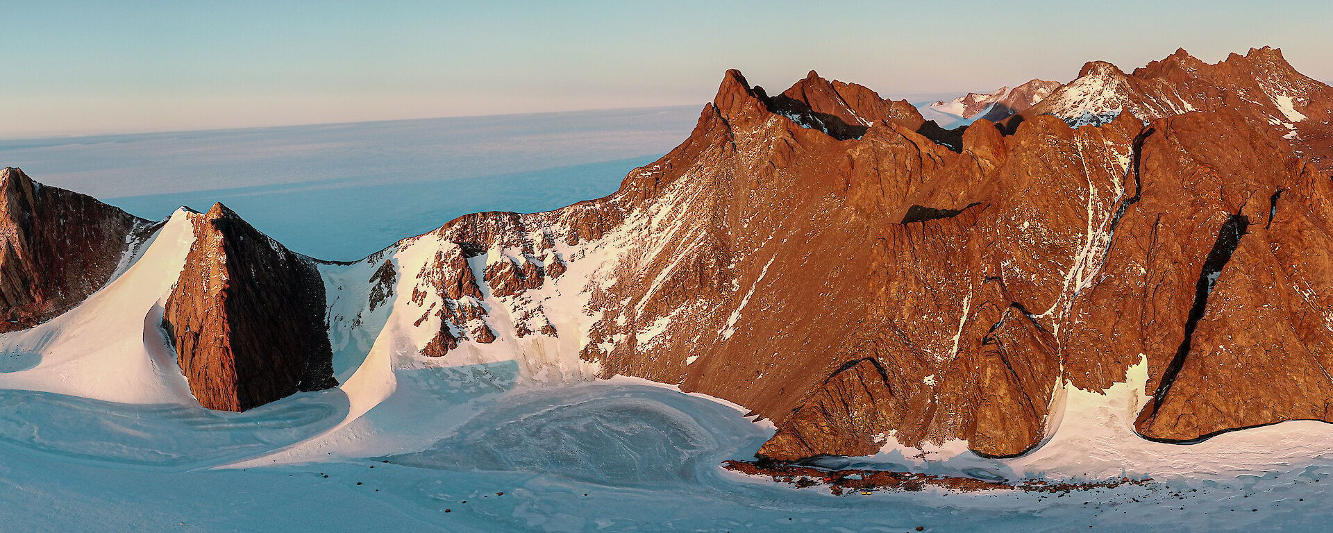 Aerial view of rocky mountains and the icesheet