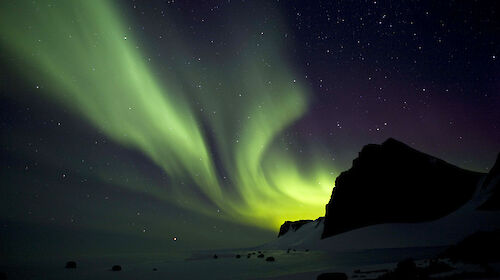 Swirling green aurora