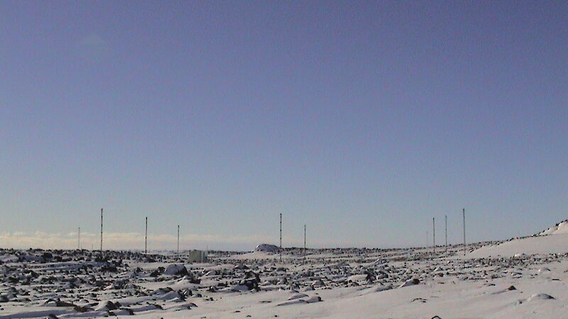 Ice-covered area has an array of radar masts.