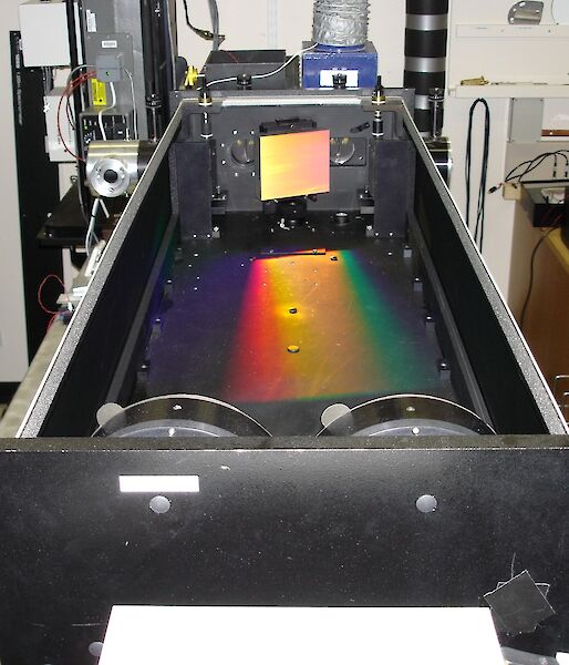 Spectrometer in the optical laboratory at Davis station, Antarctica — looks like a rainbow in a metal box