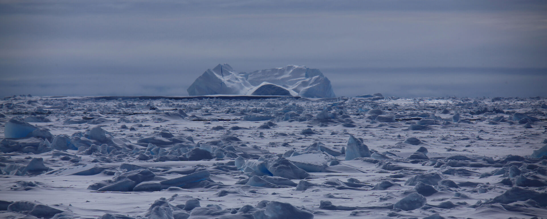 Rounded knoll of ice rising above the general level of the surrounding ice field