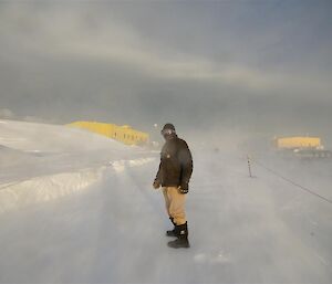 Casey expeditioner in blowing snow