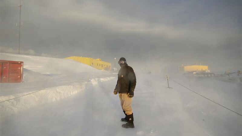 Casey expeditioner in blowing snow