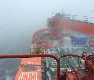 Bow of ship in snowy conditions