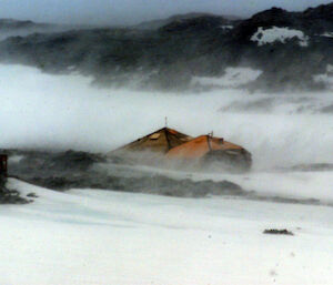 Mawson’s huts in a blizzard