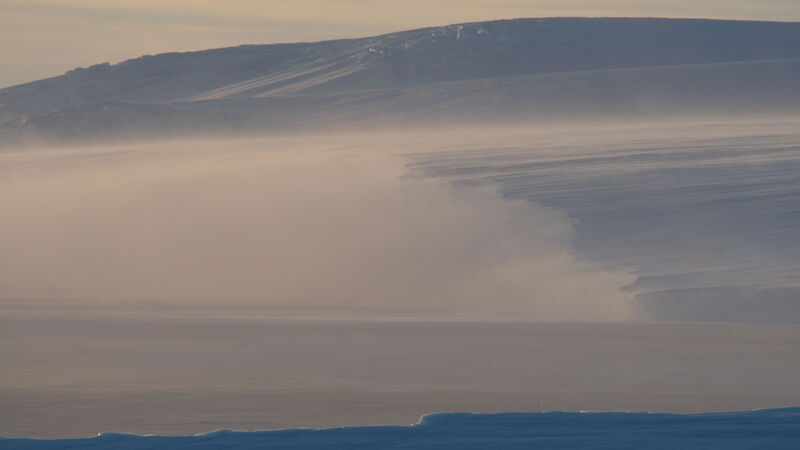 A katabatic wind blows snow off the plateau