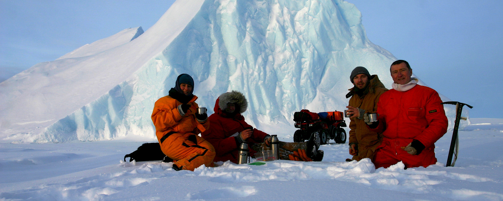 Coffee break on the sea ice near grounded iceberg