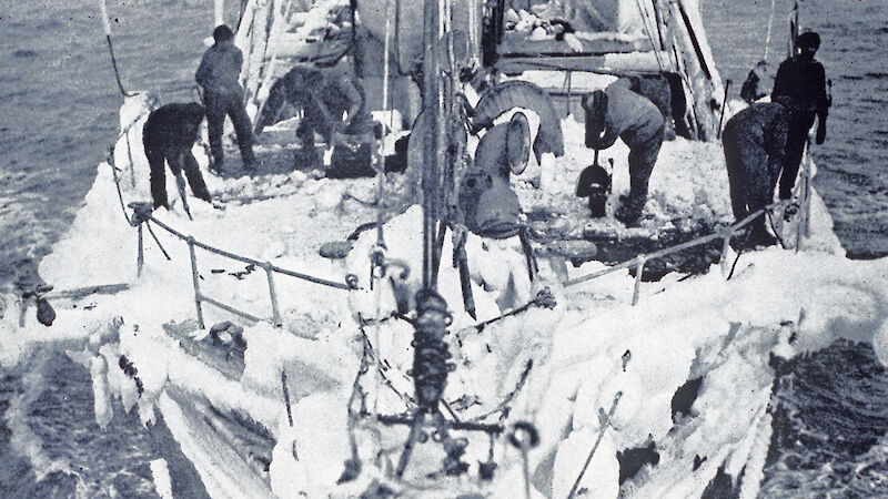 Shovelling ice off deck of Aurora.