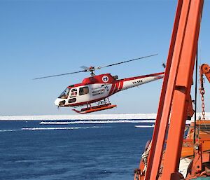 Helicopter takes off from ship