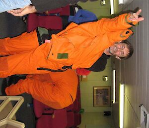 In-going station leader puts on an immersion suit