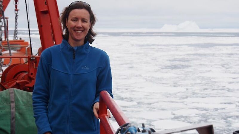 The blog author standing on the ships deck with a view of ice and open water