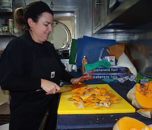 Chef chopping pumpkin