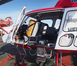 Helicopter with yellow bag on the front seat