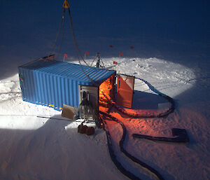 The on-ice container housing the krill pump operates late into the night (Photo: Kym Newbery)