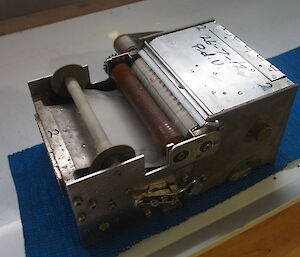 The internal cassette of the CPR containing the silk mesh wound around a spool