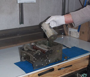 The silk mesh is removed from the CPR and preserved in formalin for later microscopy