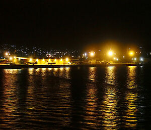 Lights from the wharf as the ship departs (Photo: Wendy Pyper)