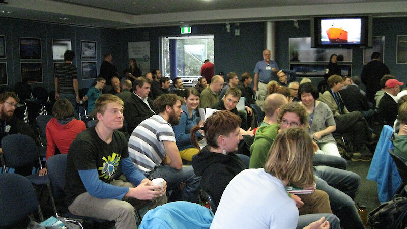 Scientists chat amongst themselves prior to pre-departure training.