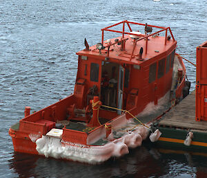 Small boat, moored.