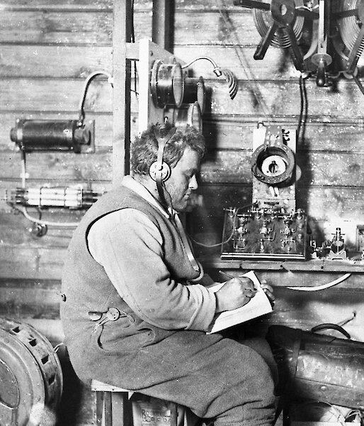 Wireless operator and mechanic sitting at wireless