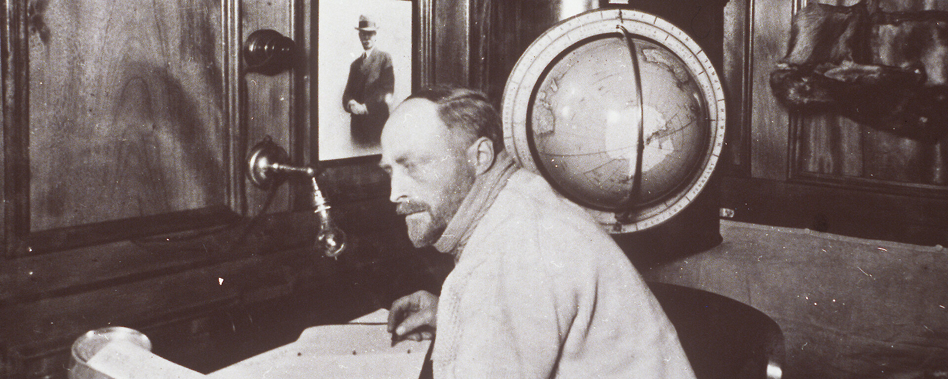 Sir Douglas Mawson in the Commander’s Cabin on the Discovery, 1929.