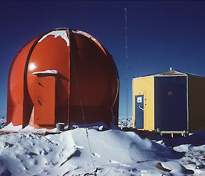 The Rawin hut and the radome building at Davis station in 1962.