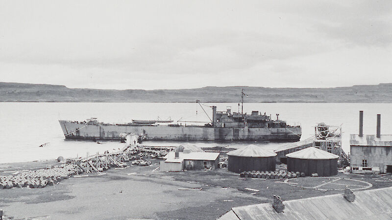 The HMALST 3501, later known as the HMAS Labuan on first ANARE voyage to Heard Island. Image shows ship at Kerguelen Island at Port Jeanne d'Arc for bunkering between 30 December 1947 and 1 January 1948