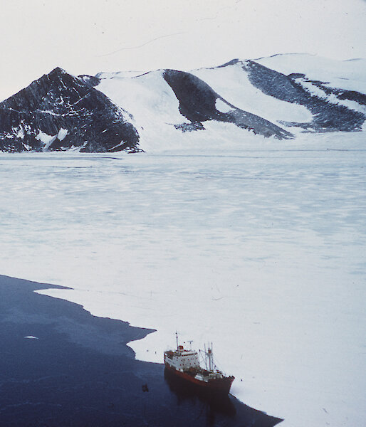 Magga Dan moored against fast ice off Magga Peak, Oates land 1959