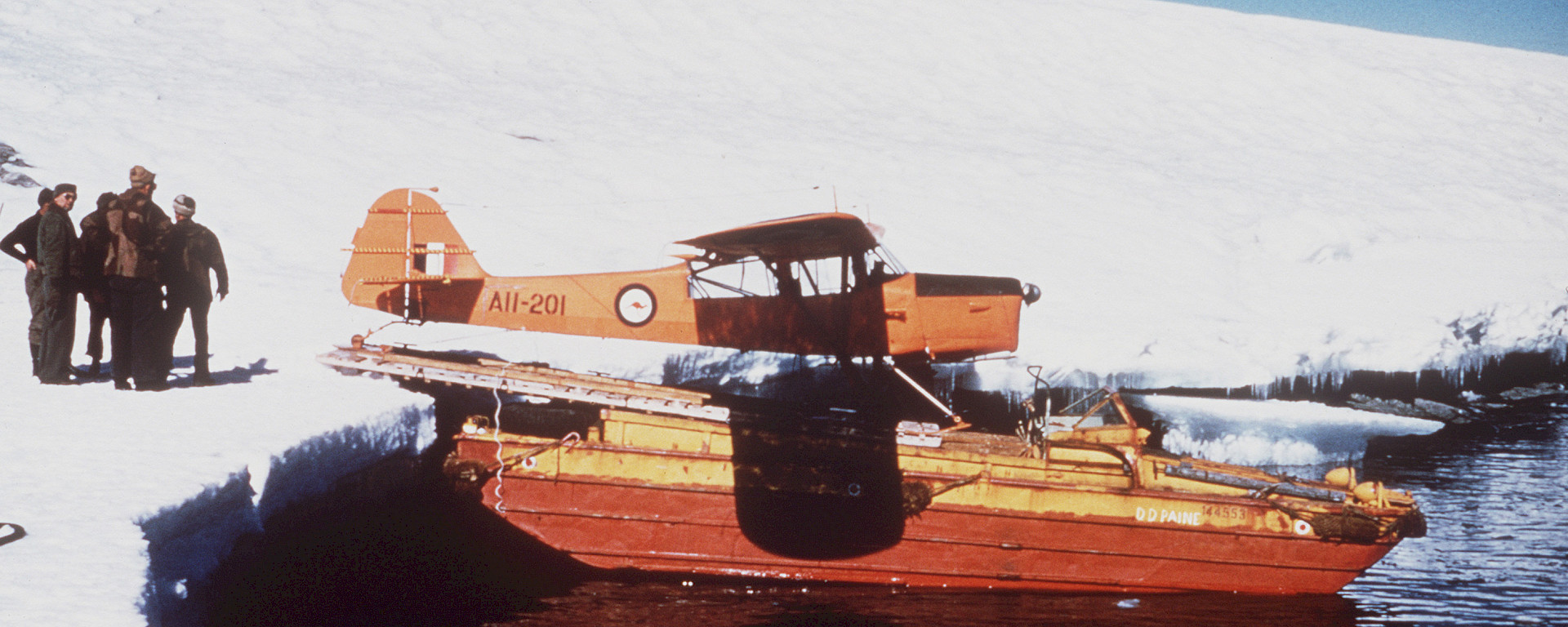 Loading Auster onto barge