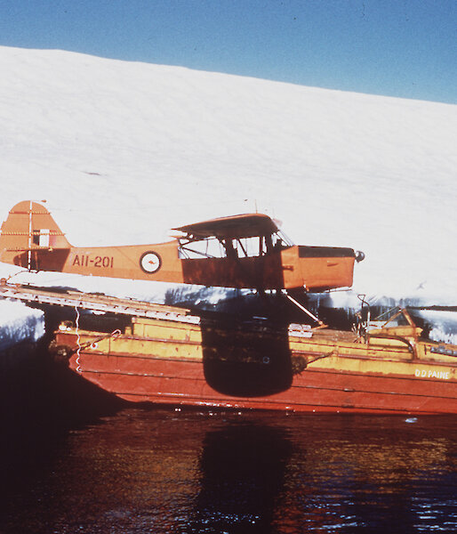 Loading Auster onto barge