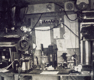 Room of old fashioned radio reels and head sets.