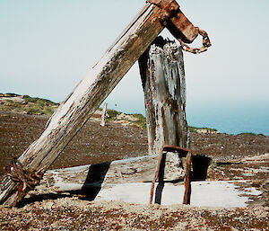 Wooden stump of the mast looking weathered and worn.