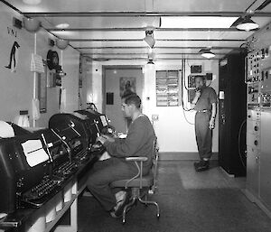 Telex room with communications equipment and operators