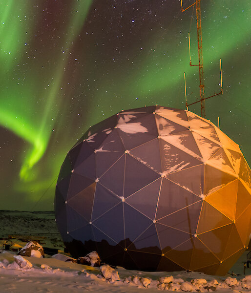 Green Aurora australis above the Davis ANAREsat dome