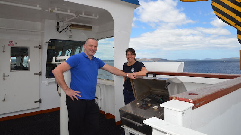 2 crew members on board a ship.