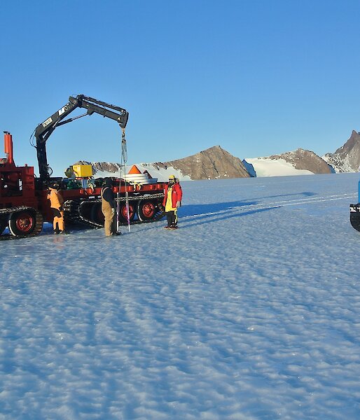Poles being removed with the North Masson Ranges in the background