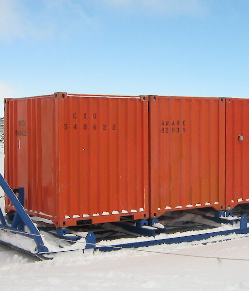 Equipment containers on sled